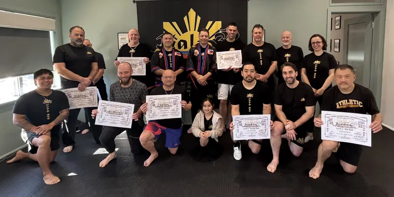 Students and instructors holding certificates on grading day at Kali 3D Ashburton